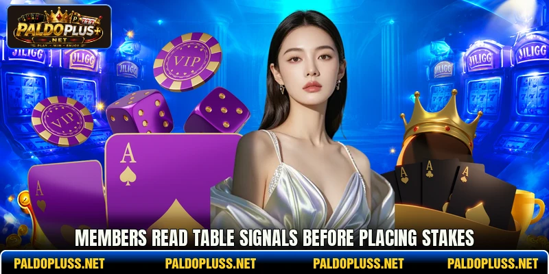 Members read table signals before placing stakes Members read table signals before placing stakes